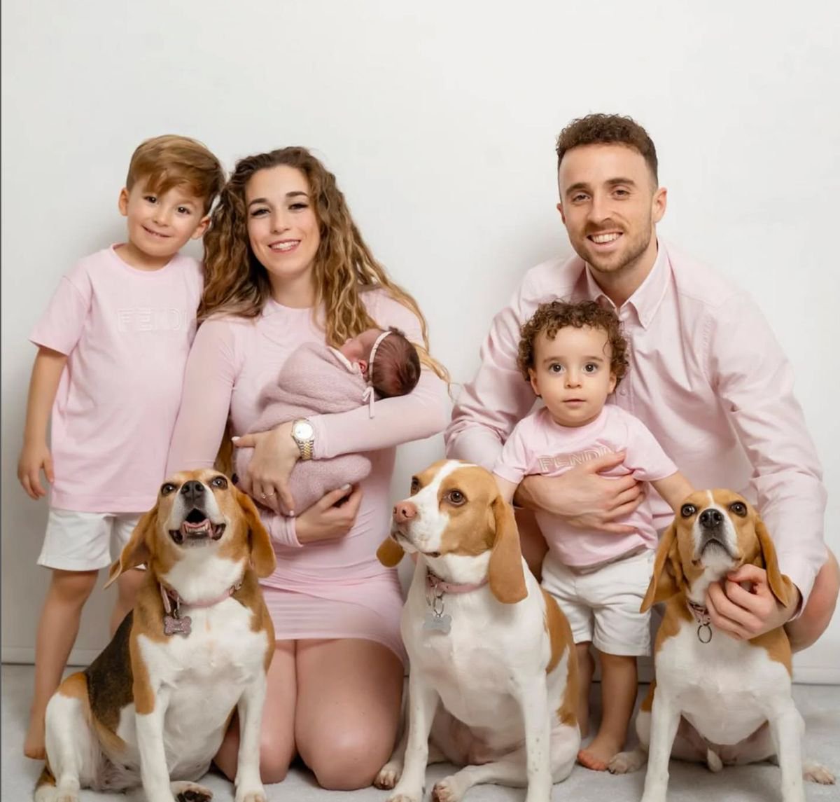 Jota with his wife, kids and dogs