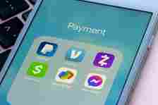 Assorted apps for peer-to-peer payment are seen on an iPhone, including PayPal, Venmo, Zelle, Cash App, Google Pay, and Facebook Messenger.
