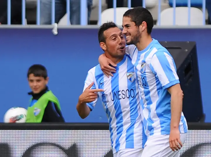A young Brahim Diaz looks on as Isco and Santi Cazorla celebrate a Malaga goal in 2012