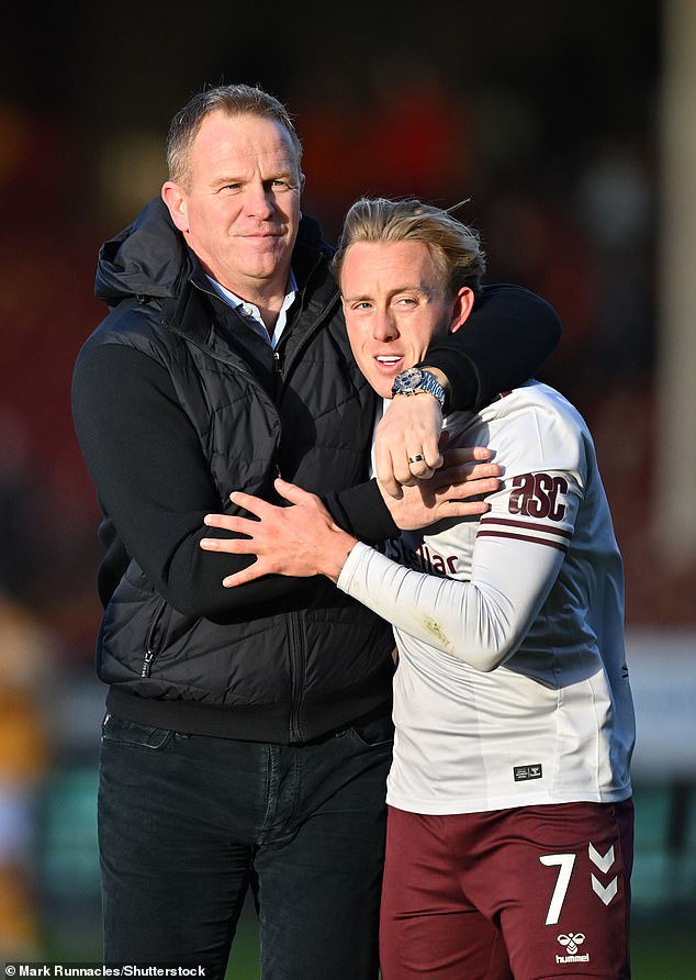 Wouter Vrancken celebrates with goalscorer Calvin Miller after ending a tough week on a high
