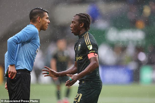 FILE - Portland Timbers midfielder Diego Chará (21) argues a call during an MLS soccer game against the Vancouver Whitecaps, Feb. 23, 2025, in Portland, Ore. (AP Photo/Amanda Loman, File)
