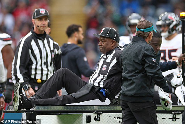 NFL umpire Larry Smith will be out for the rest of the season after tearing his quad