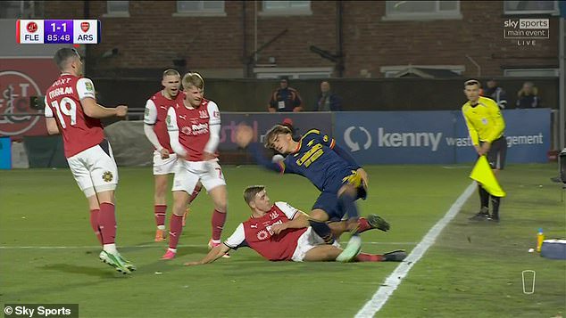 The Arsenal star reacted furiously after being on the receiving end of this Harrison Neal tackle