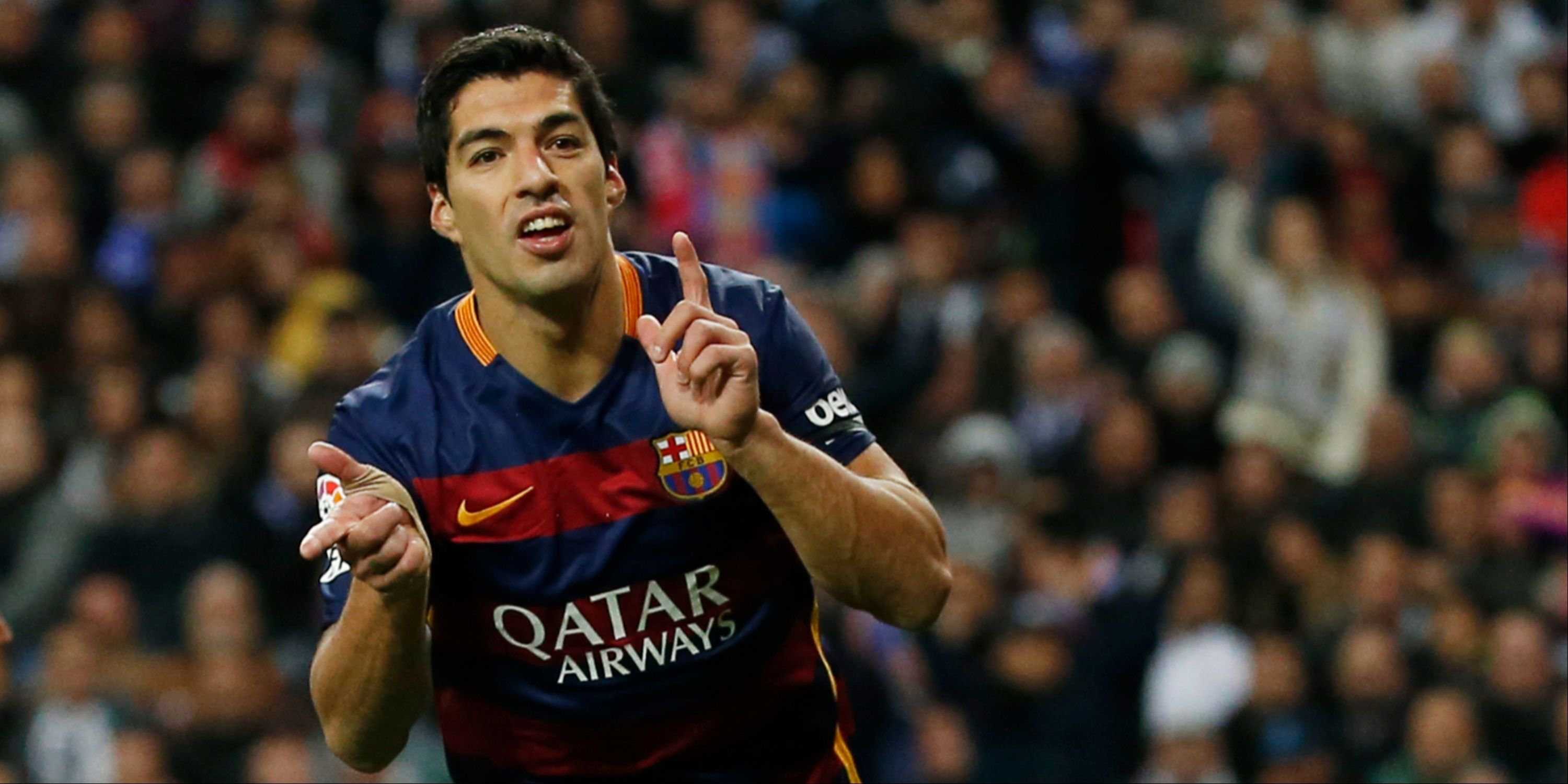 Luis Suarez celebrates scoring for Barcelona. 