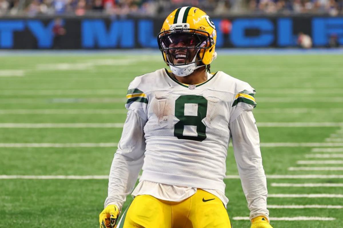 Josh Jacobs #8 of the Green Bay Packers celebrates a touchdown against the Detroit Lions during the third quarter at Ford Field on October 25, 2026 in Detroit, Michigan