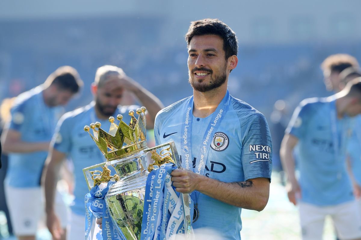 BRIGHTON, ENGLAND - MAY 12:  of Manchester City celebrates with the Premier League Trophy after winning the title following the Premier League match between Brighton & Hove Albion and Manchester City at American Express Community Stadium on May 12, 2019 in Brighton, United Kingdom. (Photo by Shaun Botterill/Getty Images)