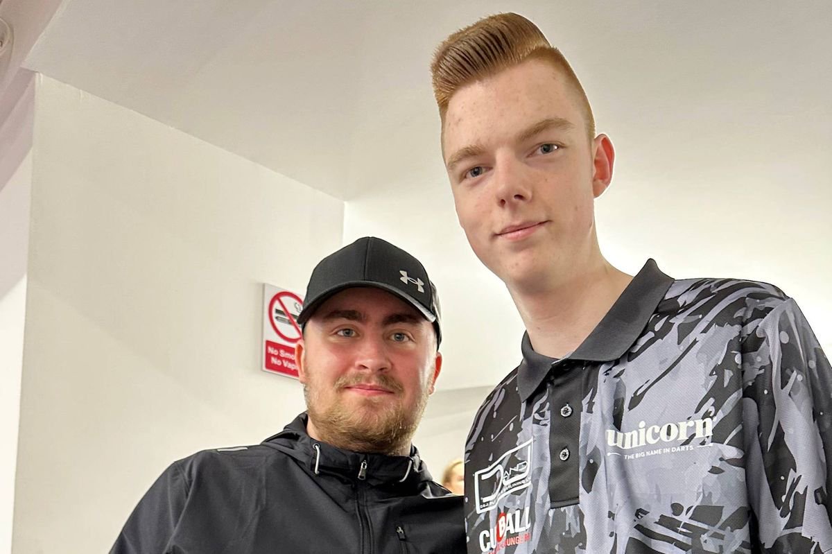 Jackson King (right) standing with his arm around Luke Littler