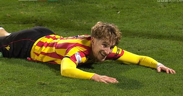 Partick Thistle front man Seb Drozd was captured smirking on the turf after his tumble