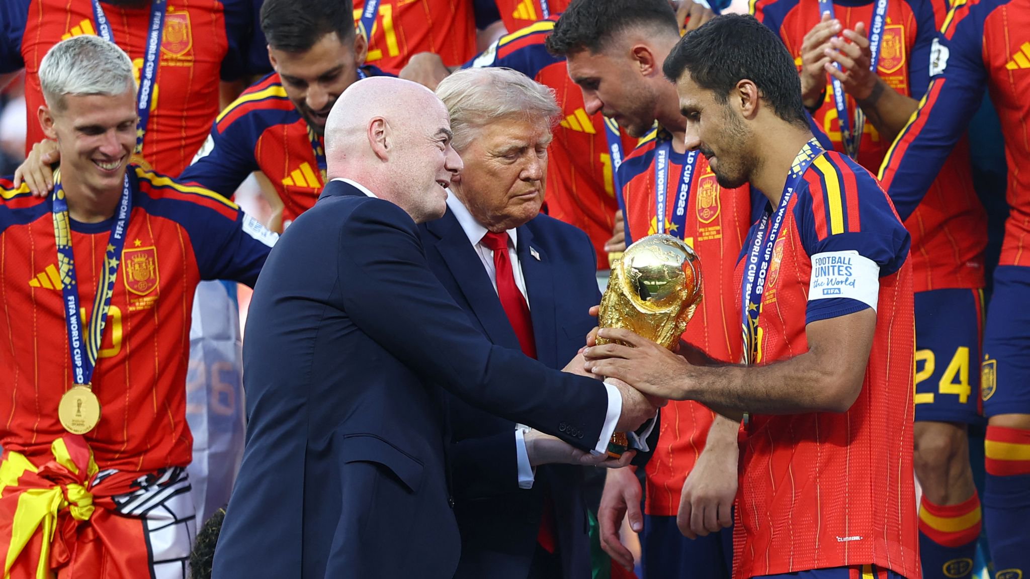 Trump and Infantino presenting the World Cup trophy to Spain in July. Pic: Reuters