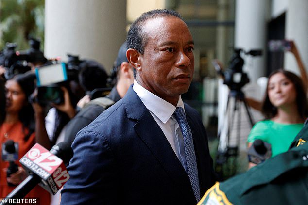 Woods appeared puffy-faced as he arrived for his change-of-plea hearing in Florida.