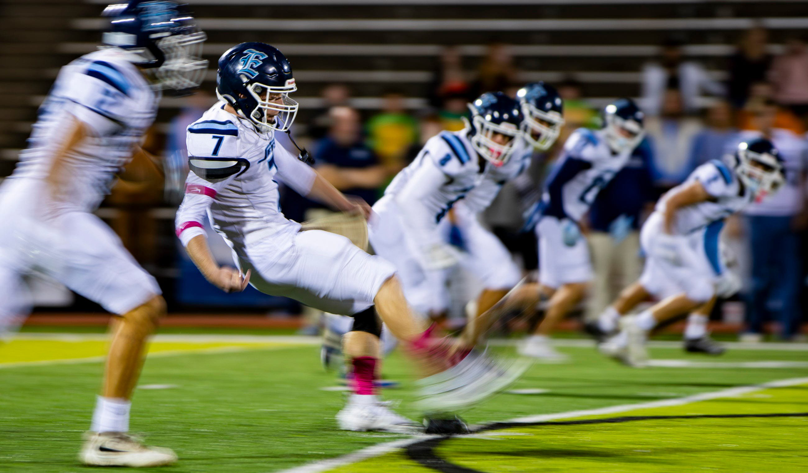 Enka's Levi Richards (7) kicks off against Asheville High in Asheville, N.C., Oct. 30, 2026.