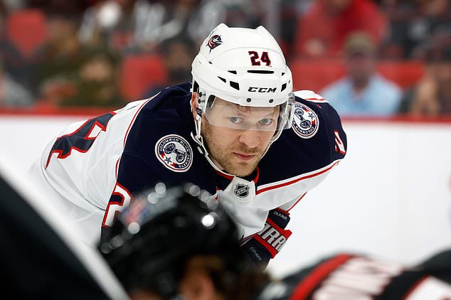 Columbus Blue Jackets' Mathieu Olivier (24) watches the puck during the first period of an NHL hockey game against the Carolina Hurricanes in Raleigh, N.C., Thursday, Oct. 29, 2026. (AP Photo/Karl DeBlaker)