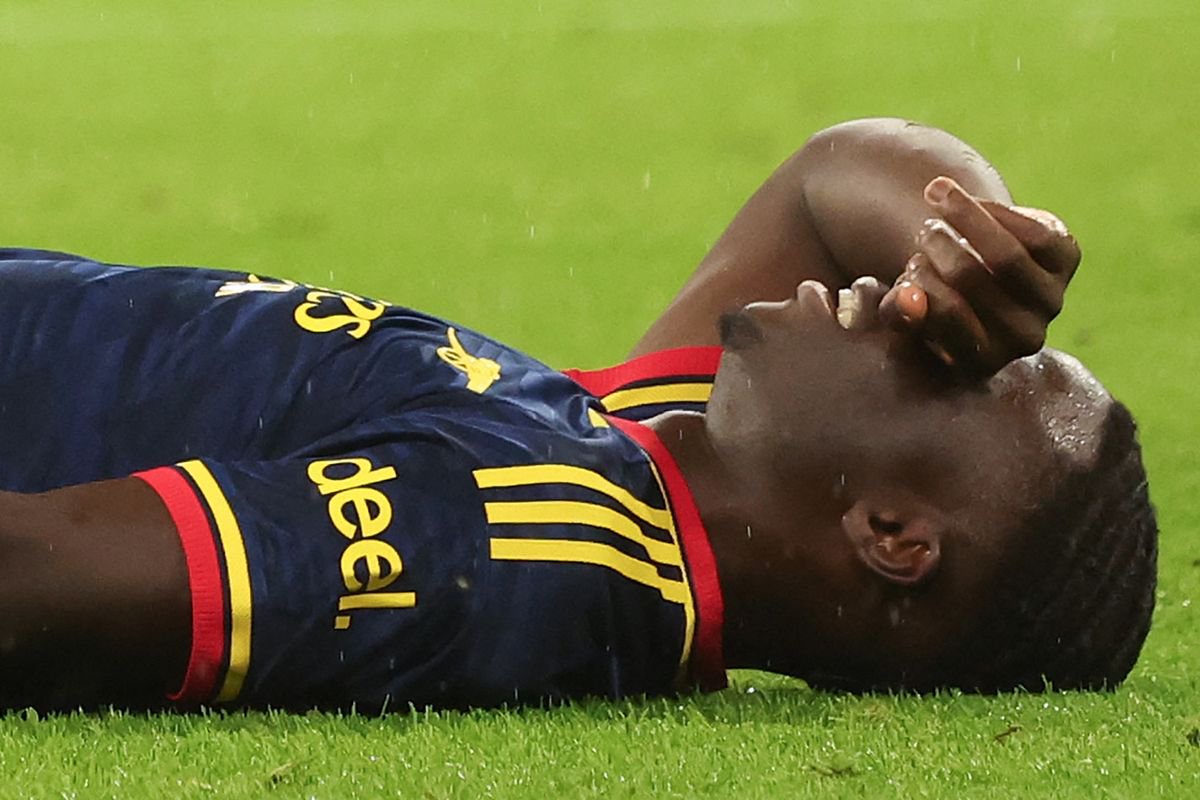 Bukayo Saka reacts after sustaining an injury during the Champions League match between Bayern Munich and Arsenal on October 21, 2026