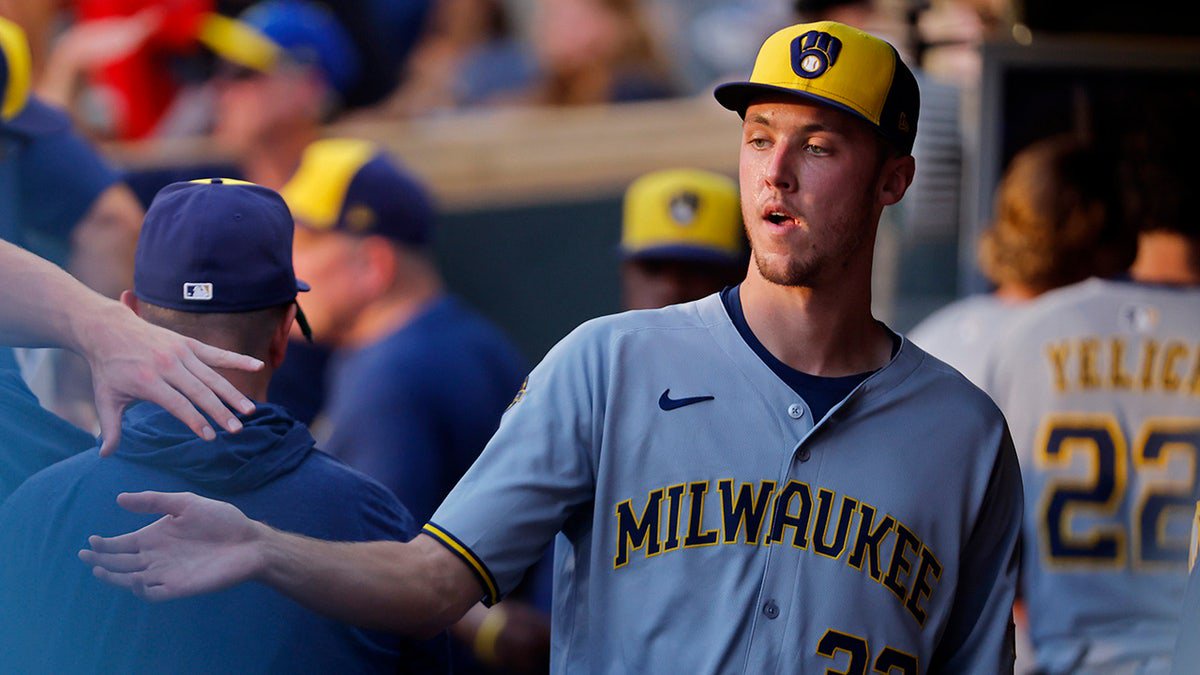 Milwaukee Brewers starting pitcher Jacob Misiorowski (32) returns to the dugout after throwing against the Minnesota Twins in the third inning of a baseball game Friday, June 20, 2025, in Minneapolis.