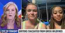 Lottie Westerling (pictured second from the right with her friend Kemi) is 'stranded' on a boat in the Mediterranean after fleeing her hotel in Kos