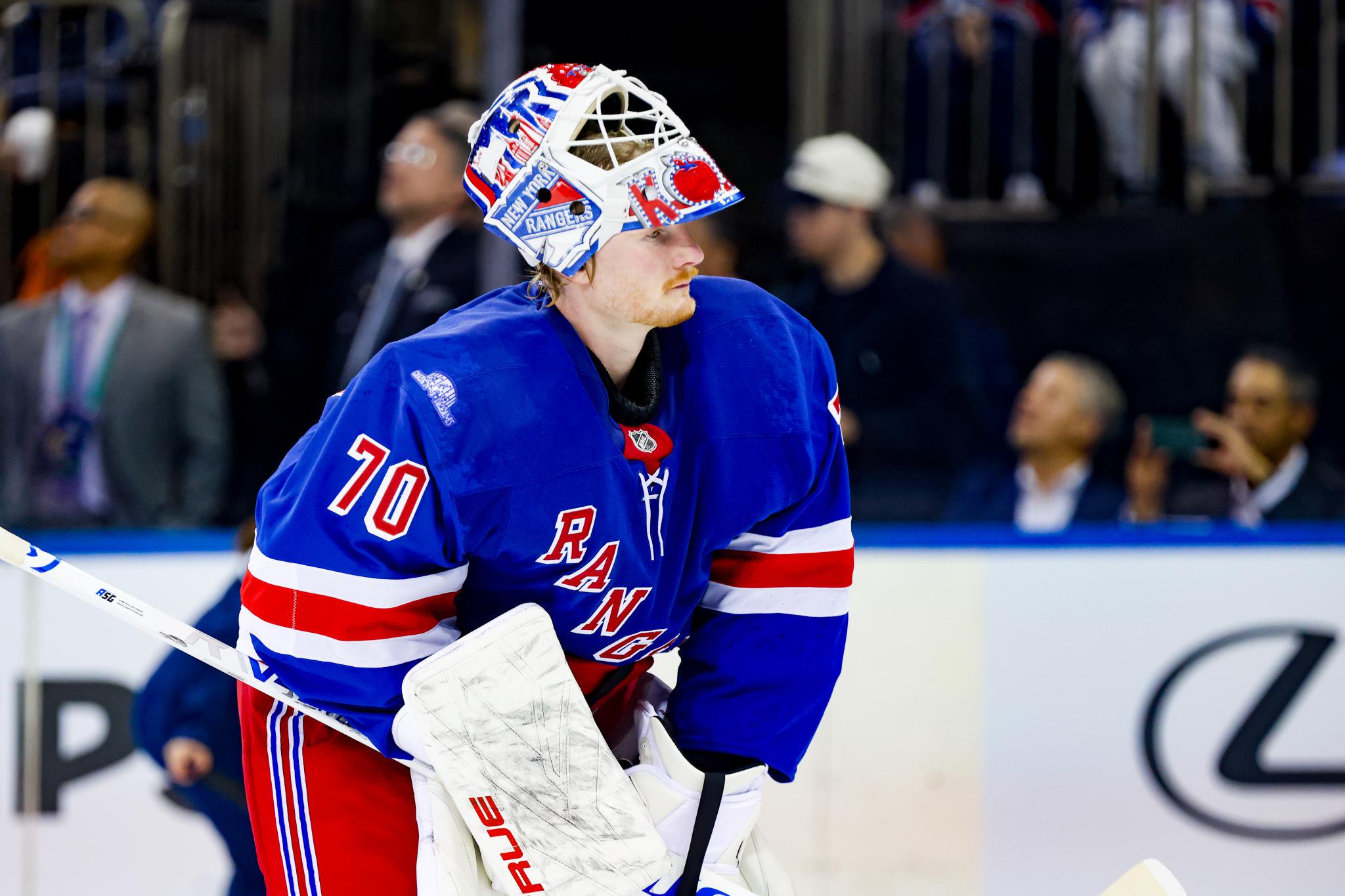 New York Rangers goaltender in uniform during a preseason game.
