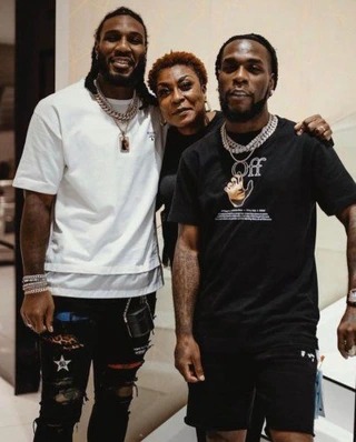 burna boy with brother and mummy
