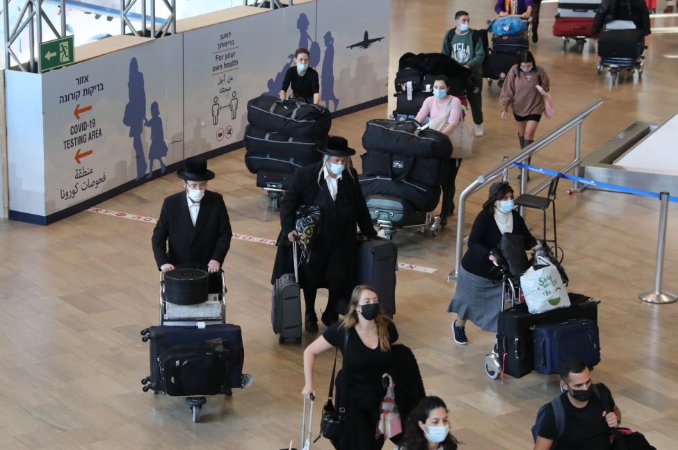 Israel bans all travel from foreigners as world COVID Omicron cases grow
