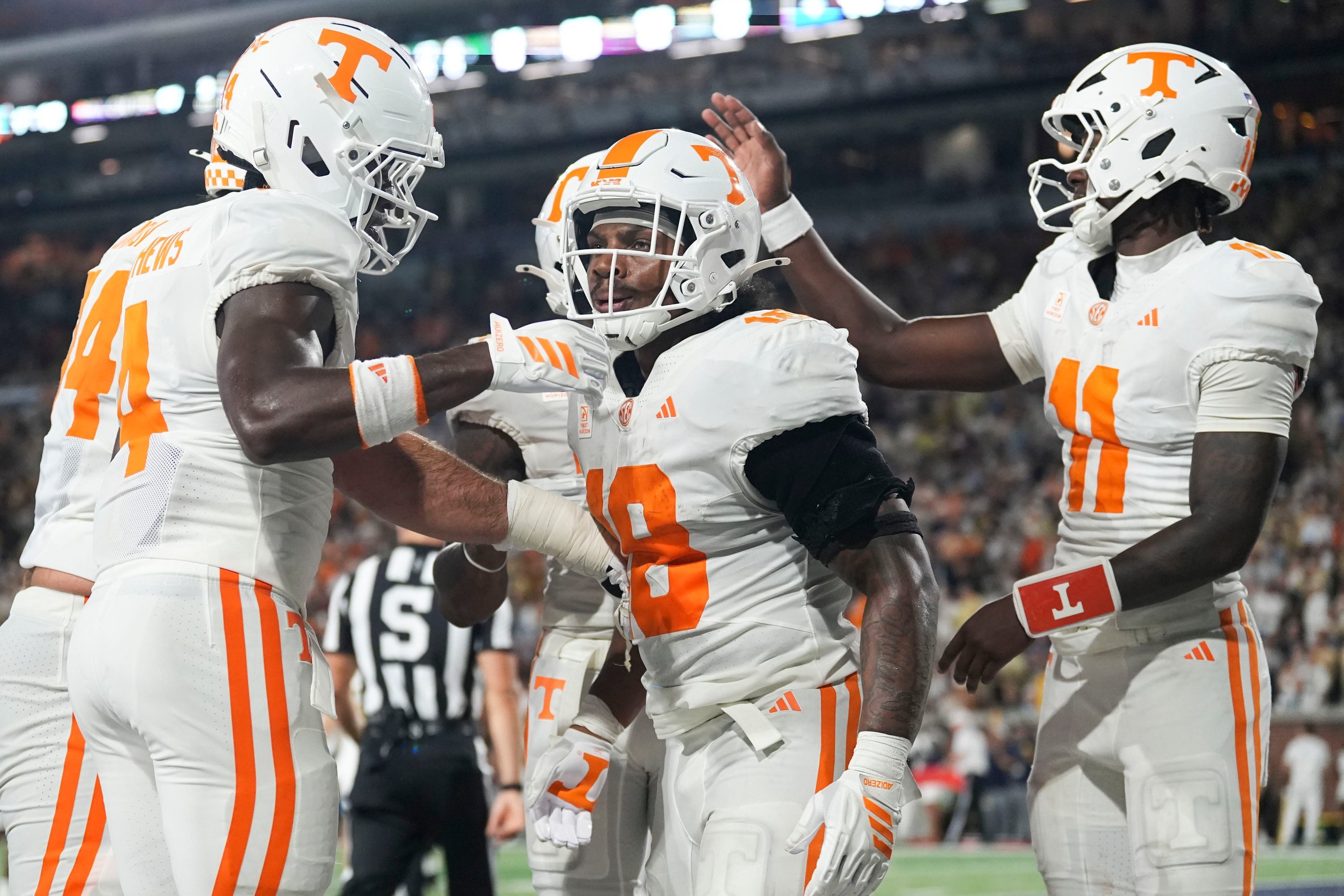 Tennessee running back DeSean Bishop (18) is congratulated after a touchdown during a college football game between Tennessee and Georgia Tech at Bobby Dodd Stadium in Atlanta, Ga., on Sept. 12, 2026.