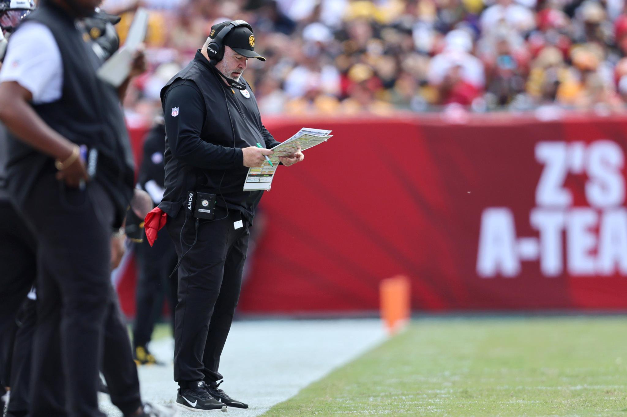 Even NFL coaches are not exempt from visiting the blue medical tent.