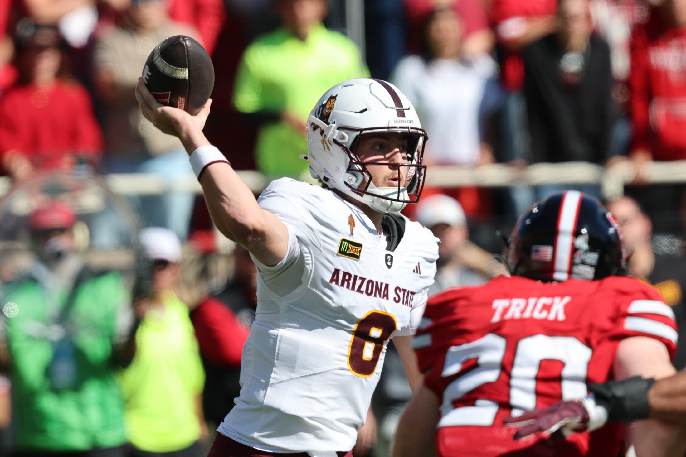 Oct 17, 2026; Lubbock, Texas, USA;  Arizona State Sun Devils quarterback Cutter Boley (8) passes against Texas Tech Red Raiders defensive end Adam Tick (20) in the first half at Galaxy Stadium.  Mandatory Credit: Michael C. Johnson-Imagn Images