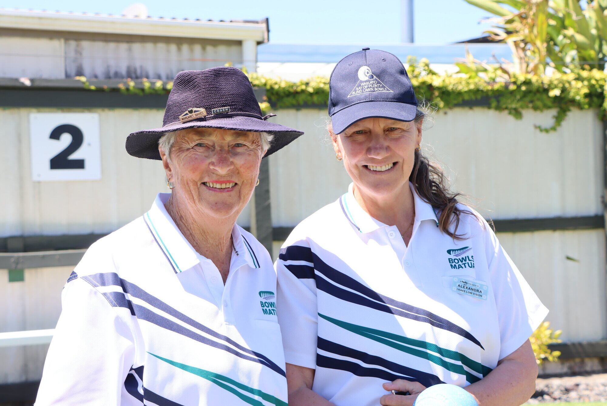 Alexandra Bishop (right) will represent New Zealand at the 2027 Blind Lawn Bowls World Championships in Auckland with her director Marg Davies (left). Photo / Kaitlyn Morrell