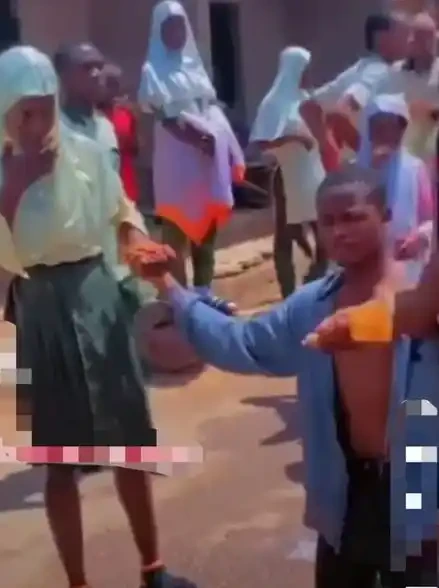 Reactions as secondary school boy propose to his girlfriend after final exams (Video)