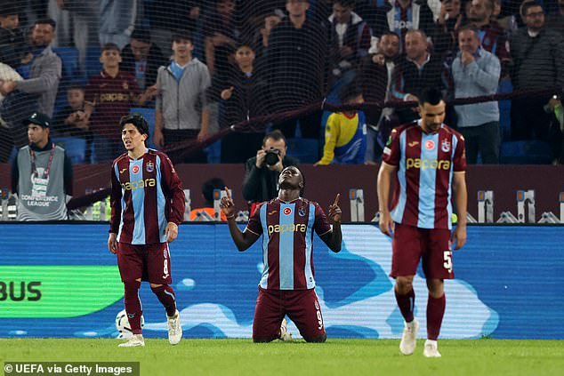 Trabzonspor striker Franculino celebrates after scoring the second following a Salah one-two