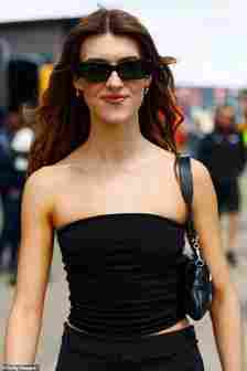 She looked stunning in her all-black ensemble as she took in the F1 sights