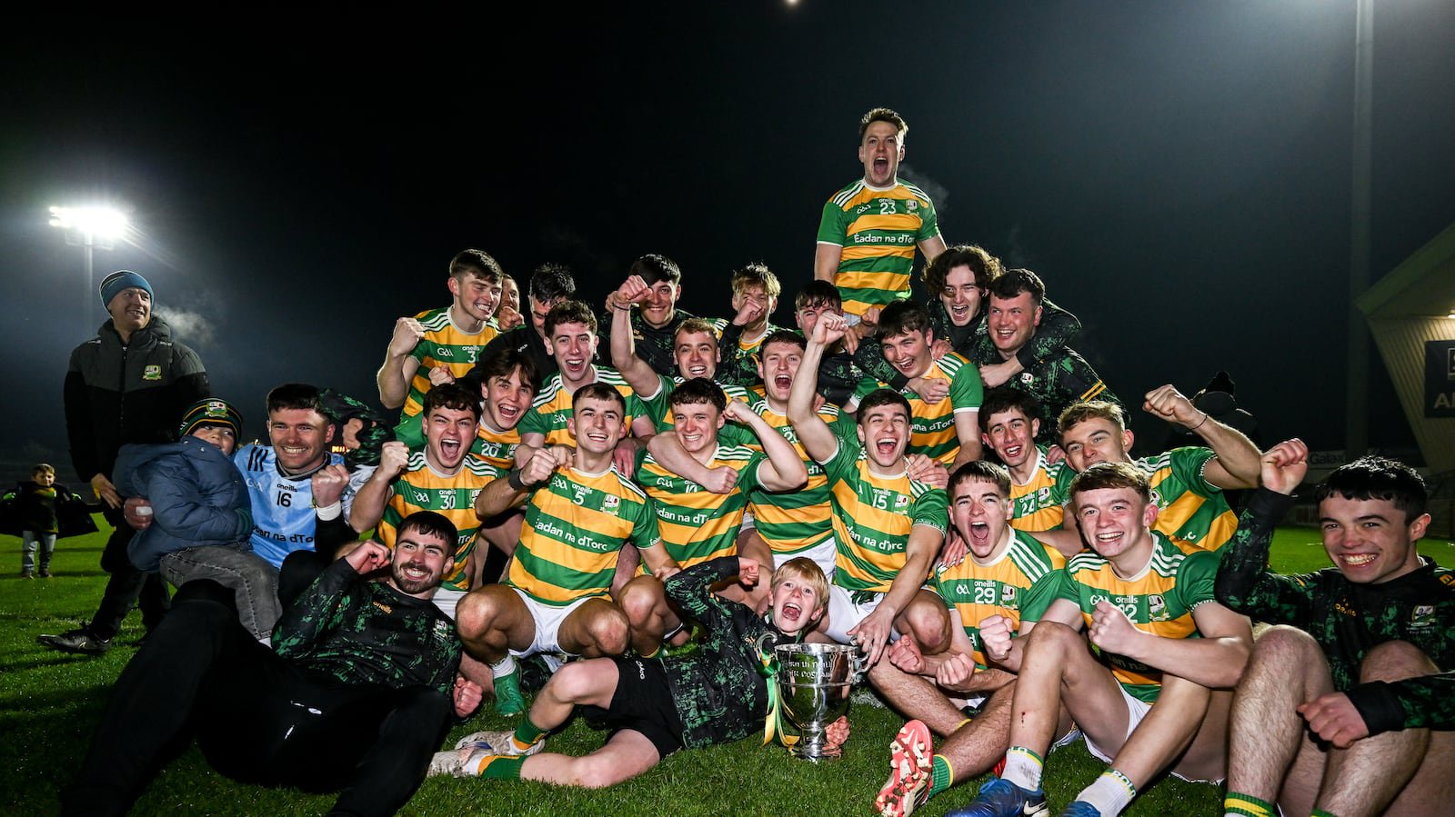 Edendork St Malachy's players celebrate with the trophy after winning the Tyrone SFC final against Errigal Ciarán at O'Neill's Healy Park in Omagh.