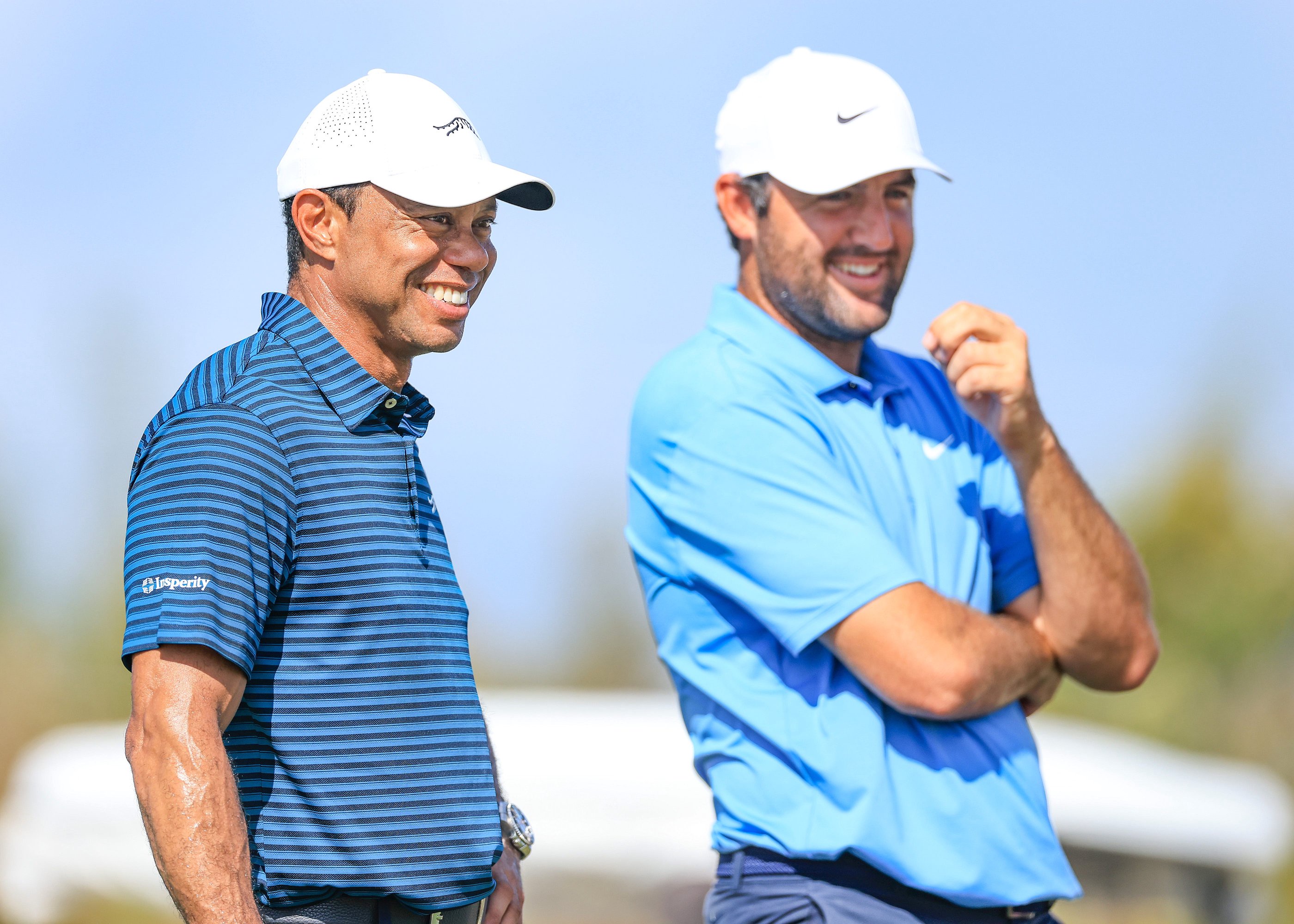 NASSAU, BAHAMAS - DECEMBER 03: Tiger Woods of The United States out on the course watching Scottie Scheffler of The United States on the 16th hole during the pro-am prior to the Hero World Challenge 2025 at Albany Golf Course on December 03, 2025 in Nassau, Bahamas. (Photo by David Cannon/Getty Images)