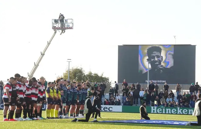 Players and fans during a minute's silence in memory of former Sale lock Hyron Andrews ahead of the Investec Champions Cup match at the Dexcom Stadium in Galway, Ireland