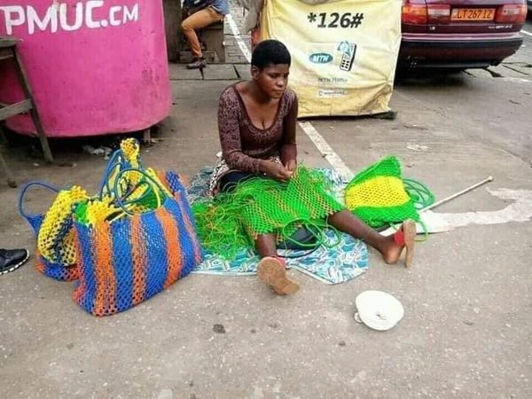 Young beautiful blind girl refuses to beg for a living, makes her own bags, and sell for money (photos)