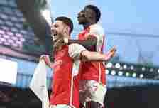 (L) Declan Rice celebrates scoring the 1st Arsenal goal with (R) Bukayo Saka during the Premier League match between Arsenal FC and Brentford FC at...
