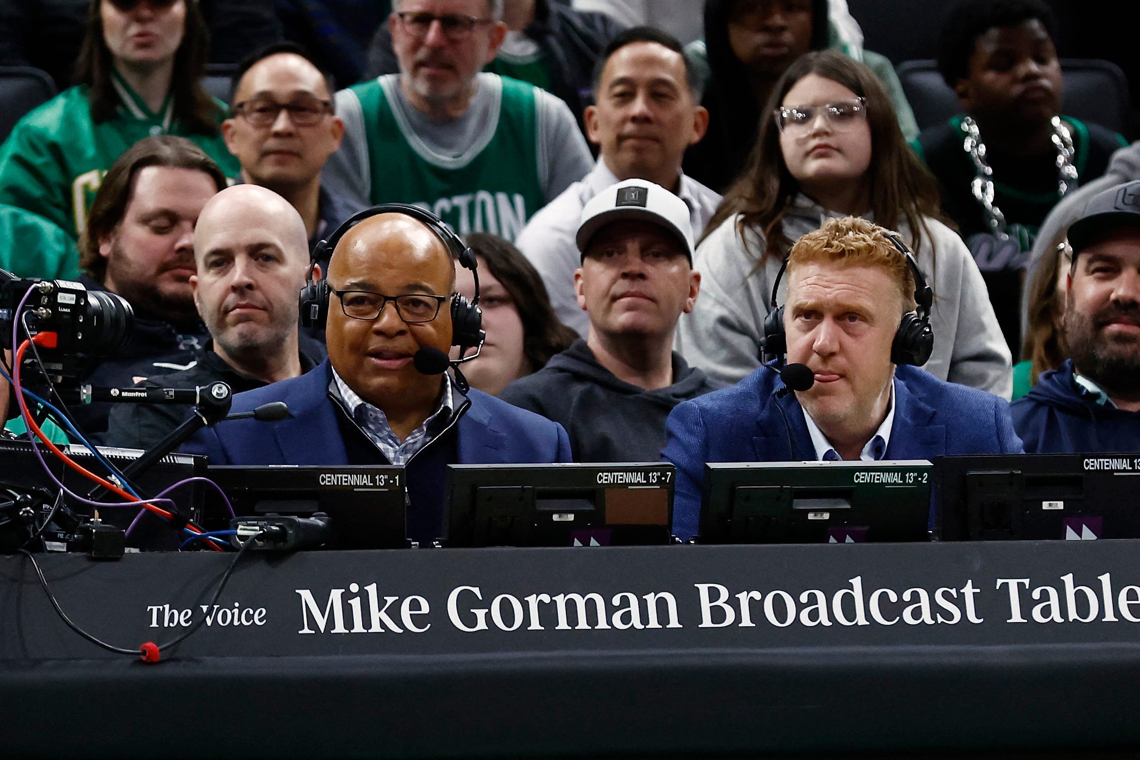 Mar 5, 2025; Boston, Massachusetts, USA; Mike Tirico, left, broadcast the game between the Boston Celtics and the Portland Trail Blazers with NBC Sports Boston analyst Brian Scalabrine during the first quarter at TD Garden. Mandatory Credit: Winslow Townson-Imagn Images