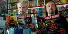 Tim and Mike reading comics in Spaced