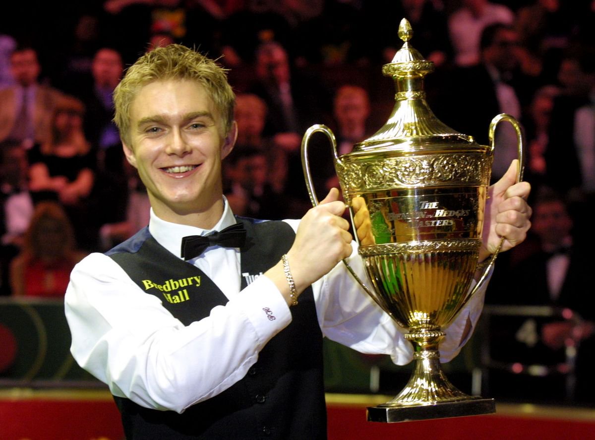 Paul Hunter lifting the Masters trophy in 2002 
