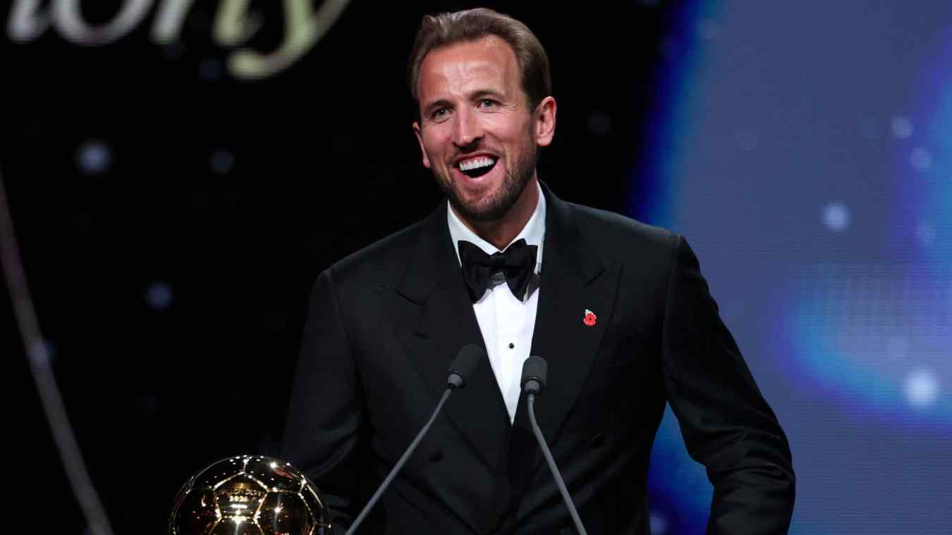 England and Bayern Munich forward Harry Kane reacts after receiving the Ballon d'Or award for the best male footballer during the 2026 Ballon d'Or France Football award ceremony at the Palladium Theatre in London on October 26, 2026.