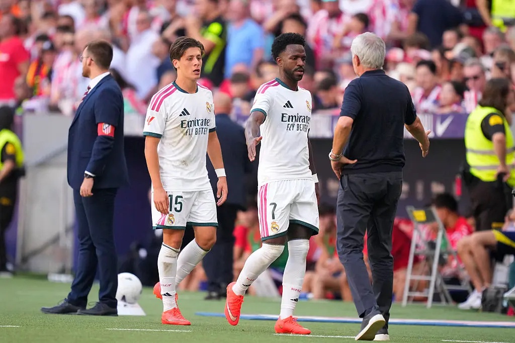Vinícius Jr with José Mourinho.