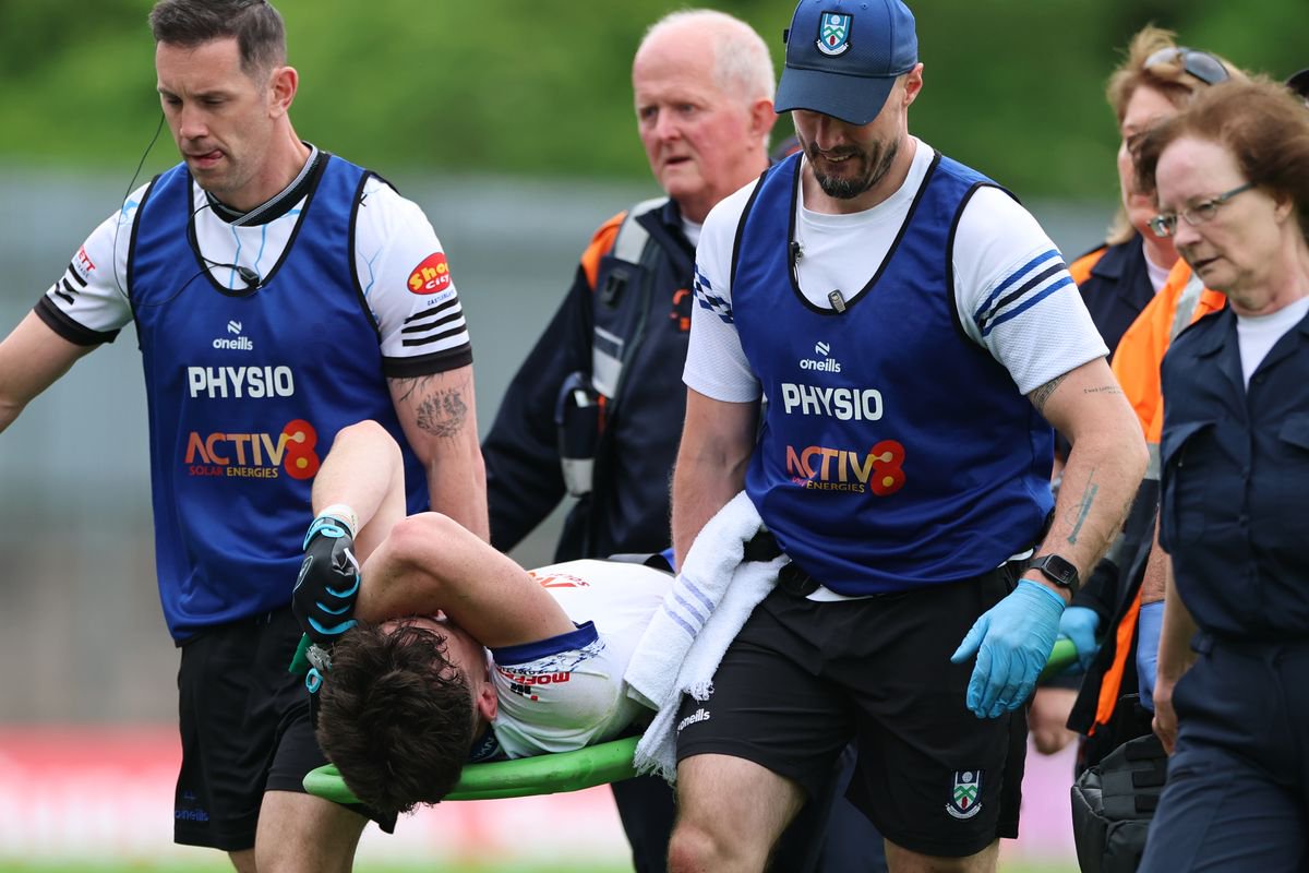 Monaghan's Bobby McCaul leaves the field injured with a cruciate ligament injury