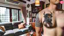 A Minotaur tattoo on the chest of a man