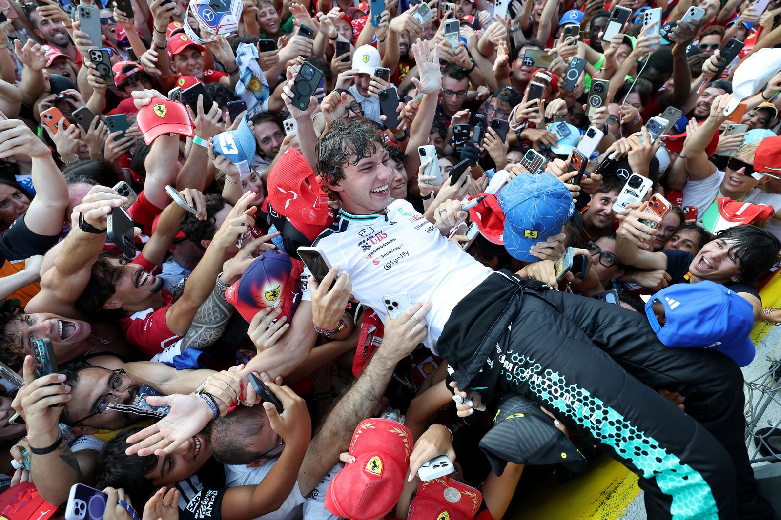 Kimi Antonelli crowdsurfing.