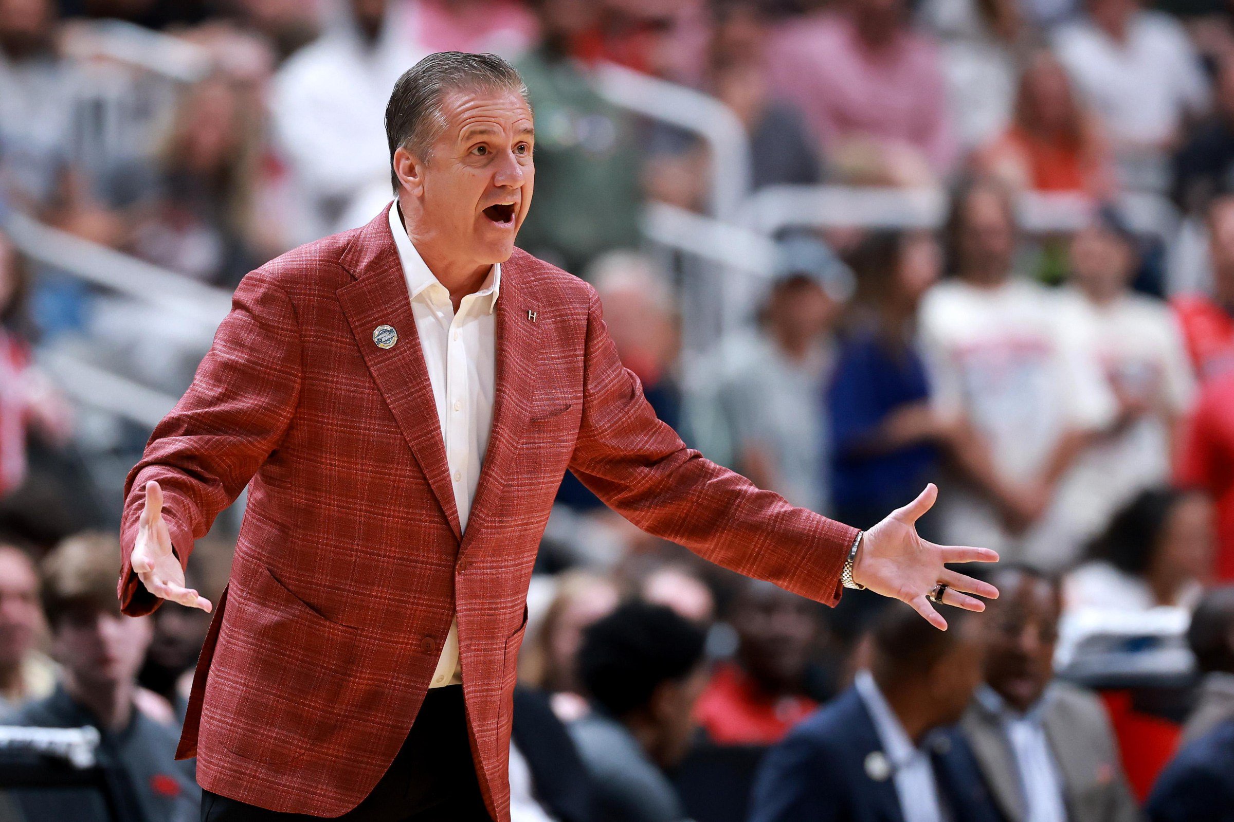 SAN JOSE, CALIFORNIA - MARCH 26: Head coach John Calipari of the Arkansas Razorbacks reacts against the Arizona Wildcats during the first half in the Sweet Sixteen of the 2026 NCAA Men’s Basketball Tournament at SAP Center on March 26, 2026 in San Jose, California. (Photo by Ezra Shaw/Getty Images)