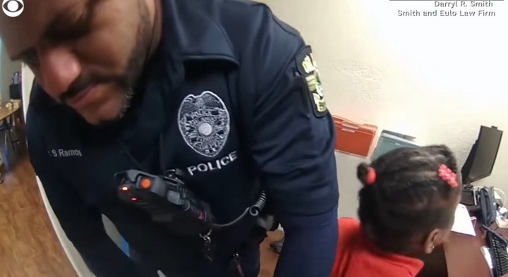 Picture of police officer Dennis Turner seen arresting Kaia. | Source: Youtube/CBS News
