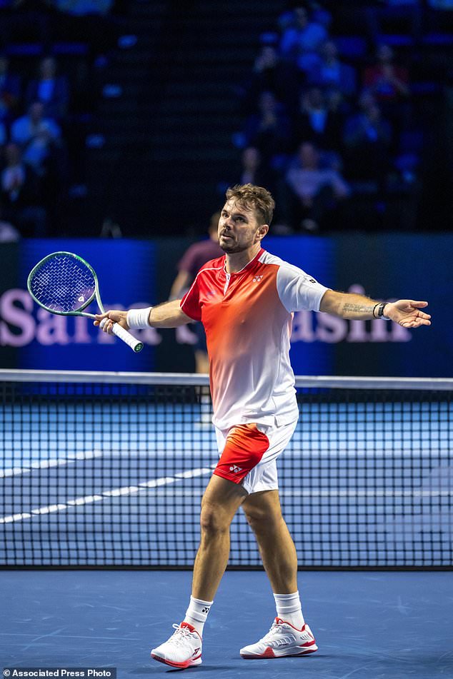 Switzerland's Stan Wawrinka reacts during a first round match against Czech Republic's Jiri Lehecka at the Swiss Indoors tennis tournament in Basel, Switzerland, Tuesday, Oct. 27, 2026. (Georgios Kefalas/Keystone via AP)