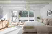 shot of neutral-styled brooklyn bedroom