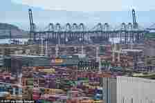 Shipping containers and gantry cranes at Yantian port in Shenzhen, in southern China's Guangdong province