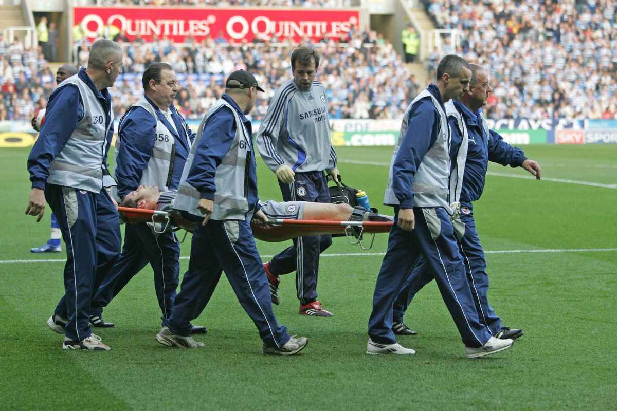 Petr Cech being stretchered off after his clash with Stephen Hunt