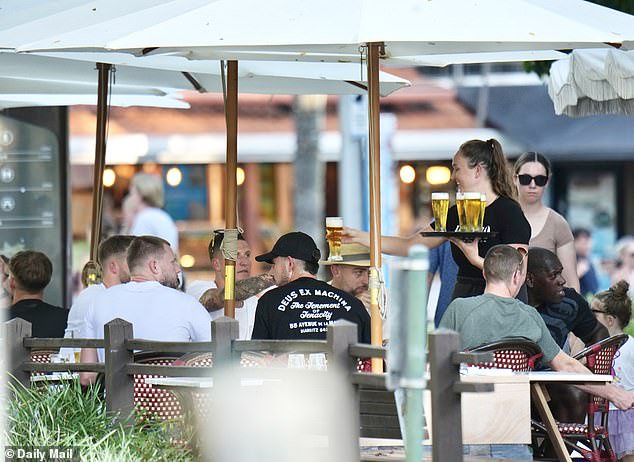 Pictured: England stars enjoying some cold beers during their beachside break in Noosa between the second and third Tests