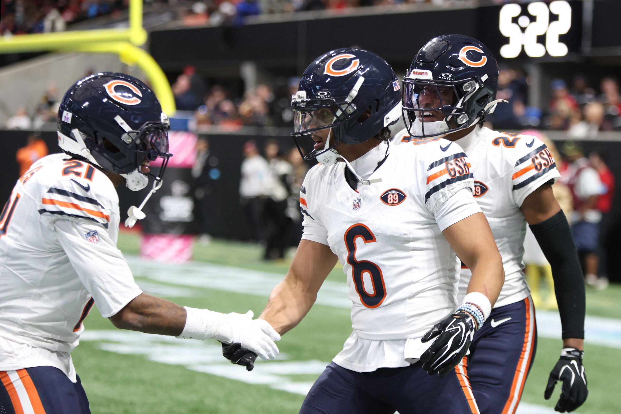 Oct 18, 2026; Atlanta, Georgia, USA;  Chicago Bears defensive back Cam Lewis (21) and defensive back Kyler Gordon (6) celebrate during the third quarter against the Atlanta Falcons at Mercedes-Benz Stadium.  Mandatory Credit: Brett Davis-Imagn Images